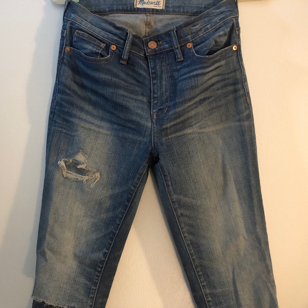 High-rise super skinny stretch rip denim.